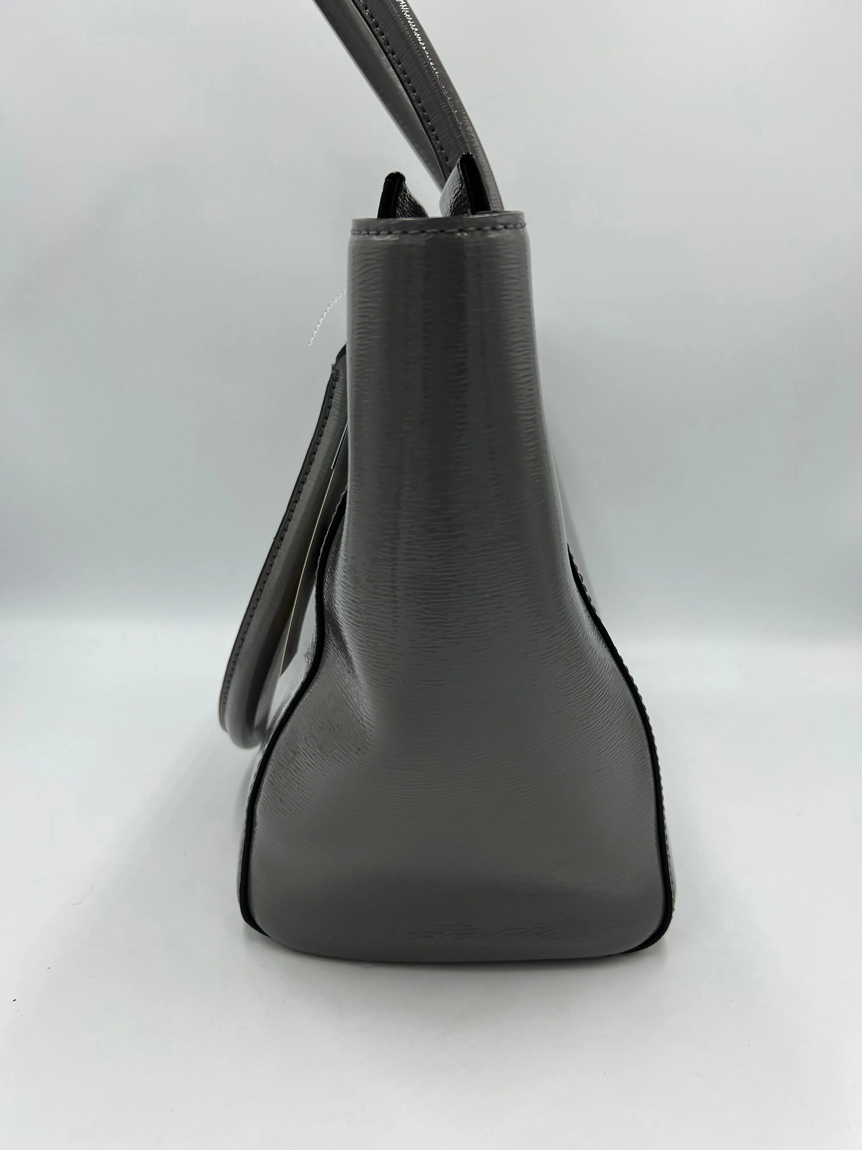 Handbag Designer By Kate Spade